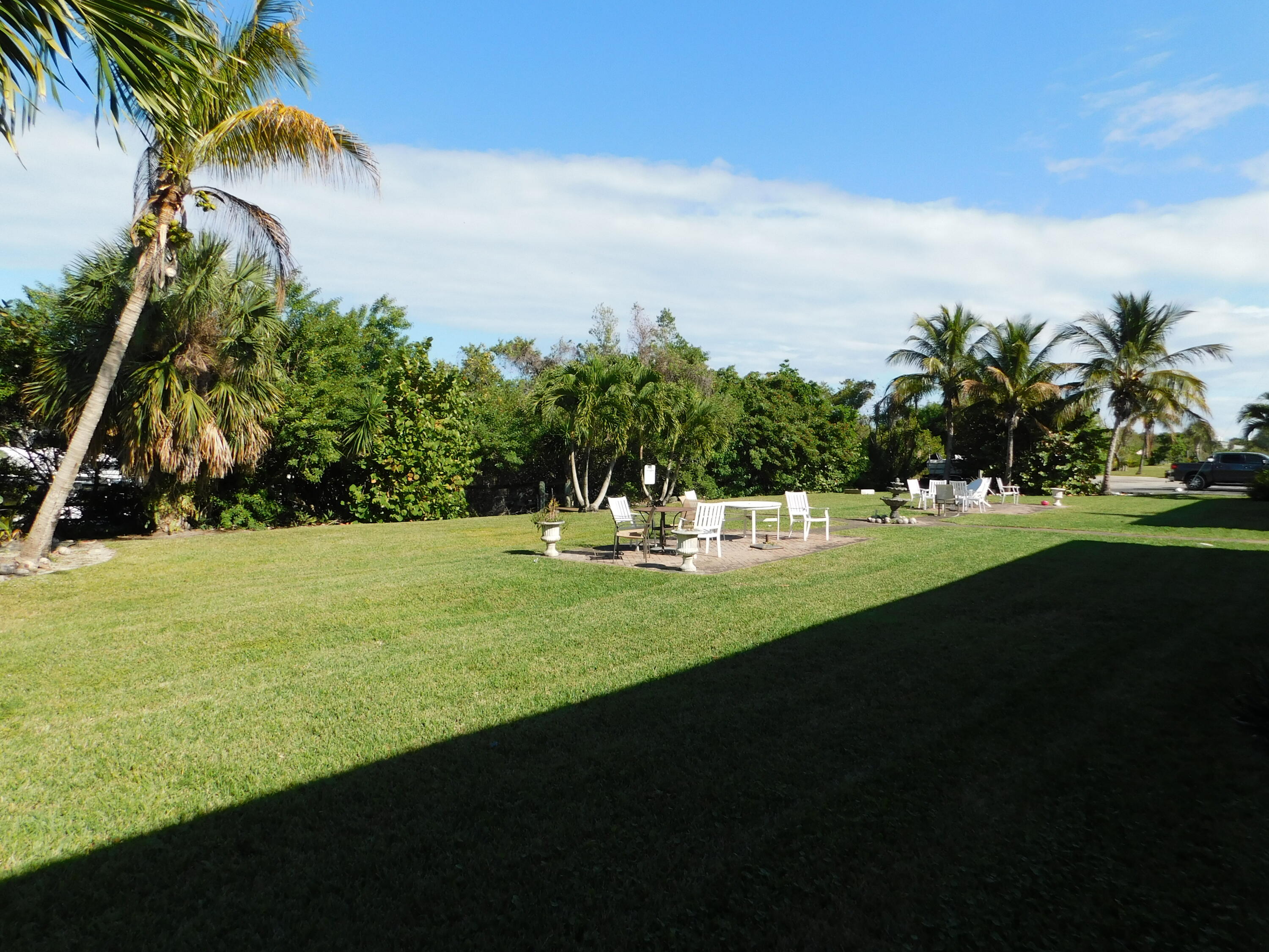 735 Hummingbird Way, Unit 202 North Palm Beach, FL 33408 - Photo 8 of 15 a view of outdoor space