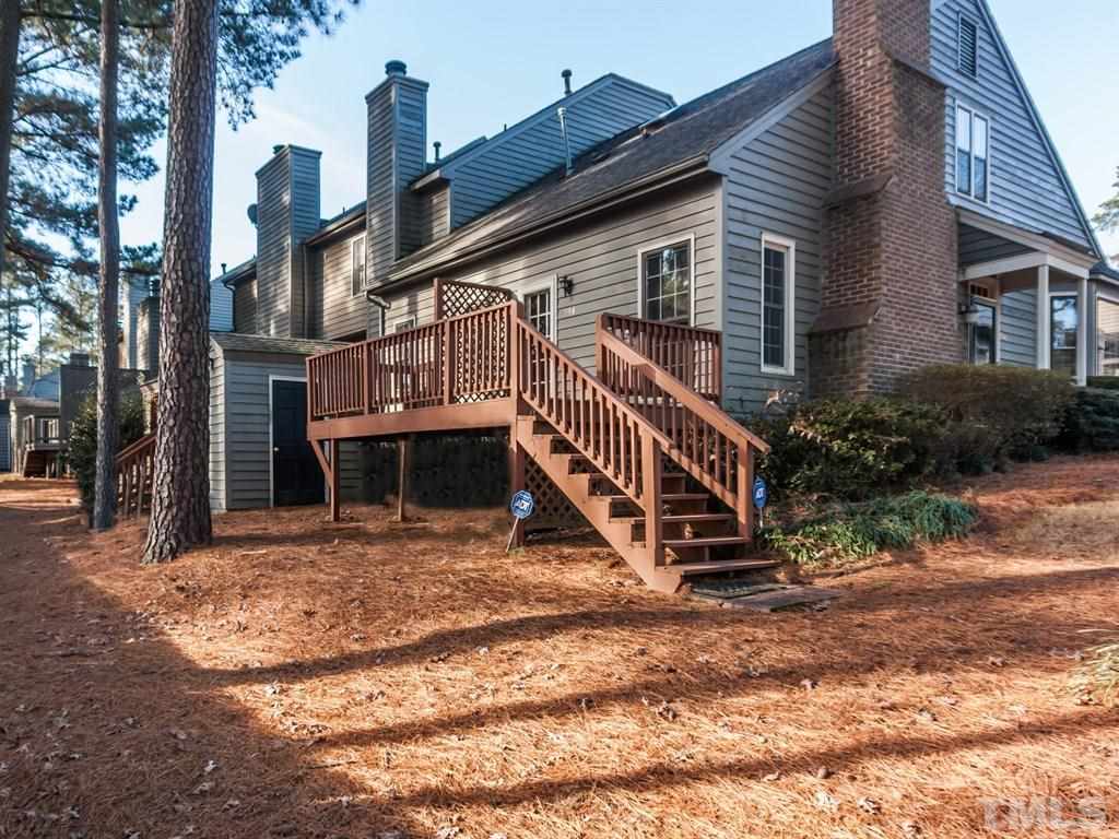 934 Albany Court Raleigh, NC 27615 - Photo 23 of 25 a view of a house with a yard