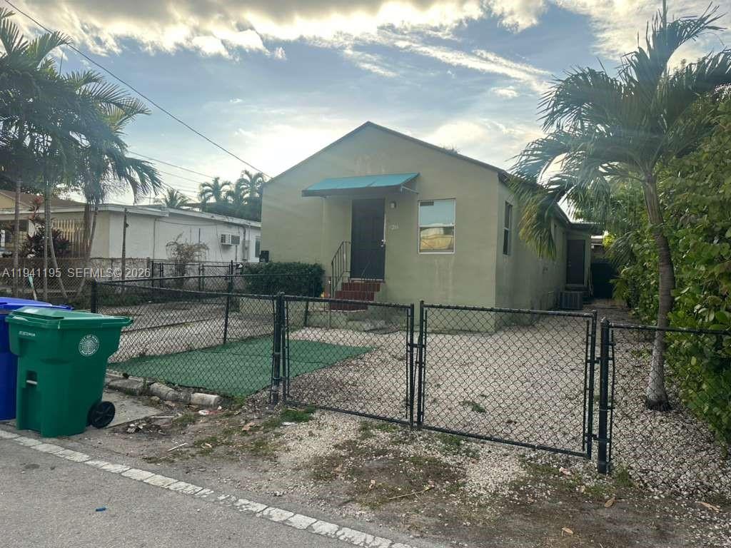 920 Northwest 22nd Court, Unit 920 Miami, FL 33125 - Photo 24 of 28 a view of a house with a backyard