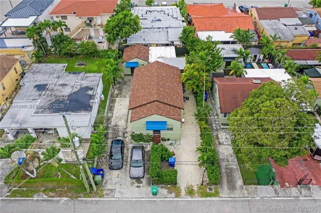 an aerial view of a house with a garden