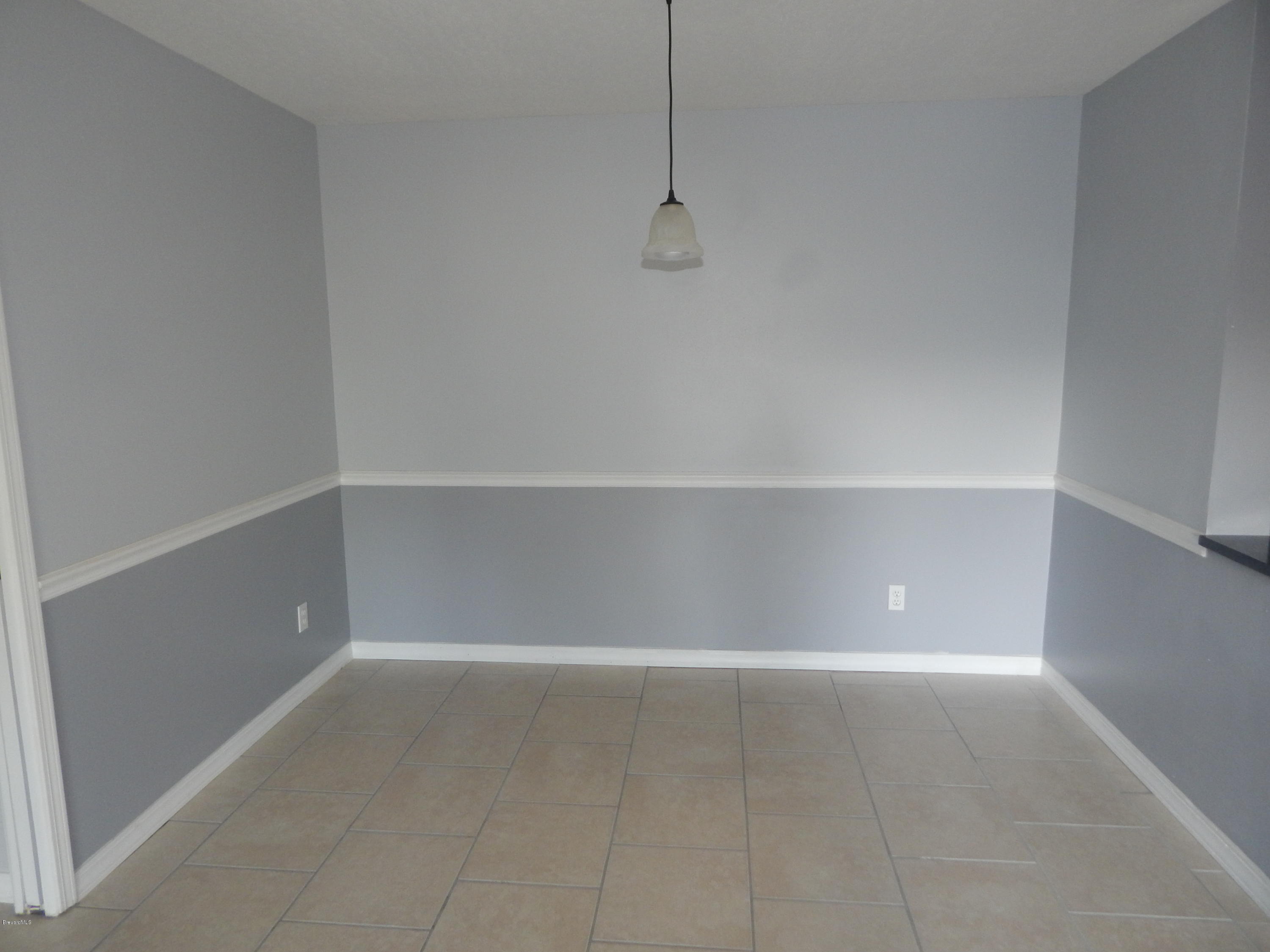 7667 North Wickham Road, Unit 112 Melbourne, FL 32940 - Photo 11 of 17 DINING ROOM