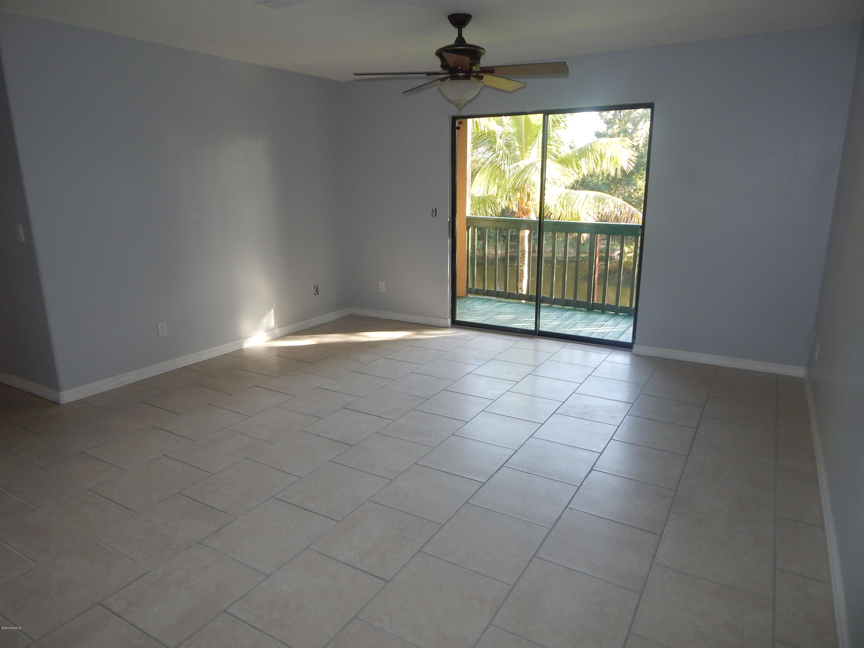 7667 North Wickham Road, Unit 112 Melbourne, FL 32940 - Photo 10 of 17 LIVING ROOM