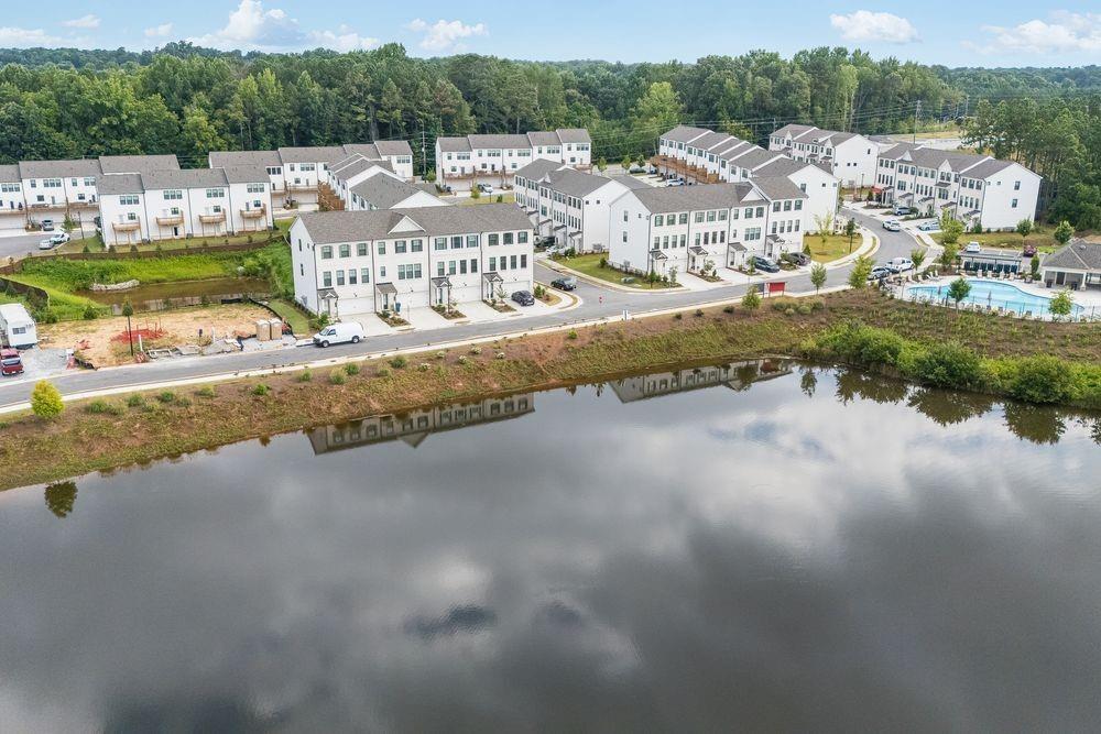 66 Wilder Ridge Way Lawrenceville, GA 30044 - Photo 33 of 44 a view of a lake with houses