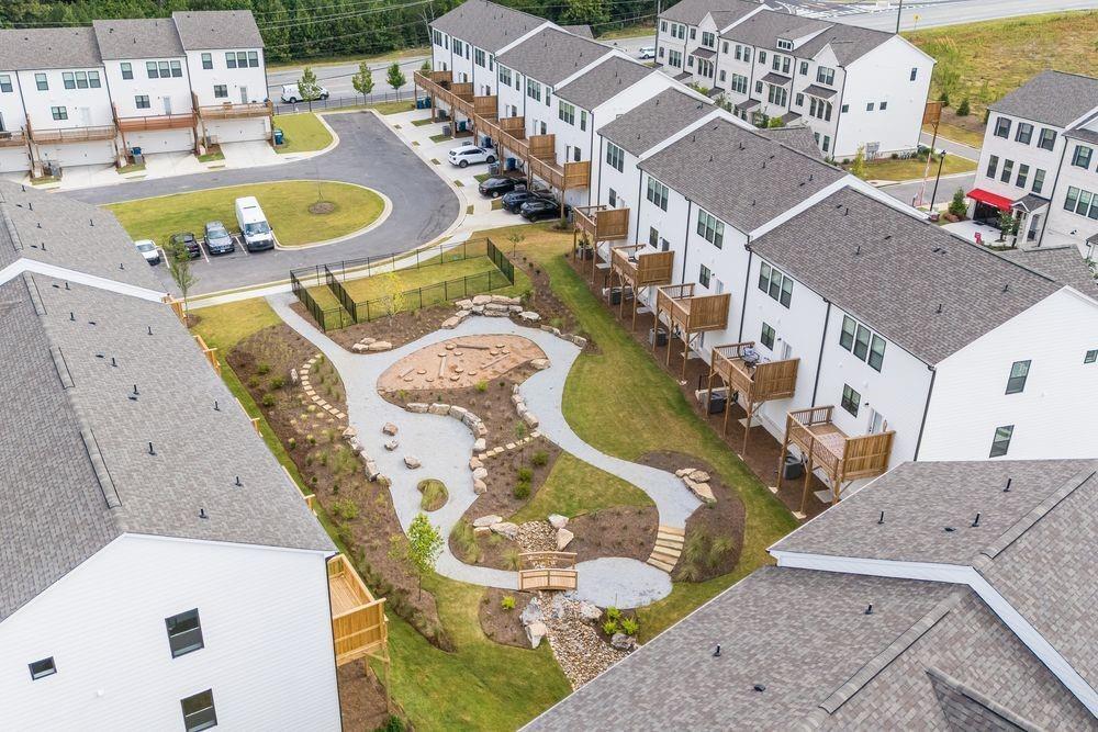 66 Wilder Ridge Way Lawrenceville, GA 30044 - Photo 35 of 44 an aerial view of a swimming pool
