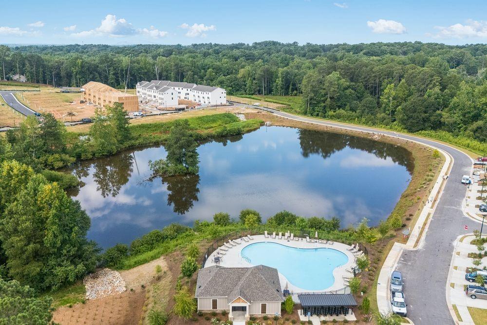 66 Wilder Ridge Way Lawrenceville, GA 30044 - Photo 36 of 44 a view of a swimming pool with a yard