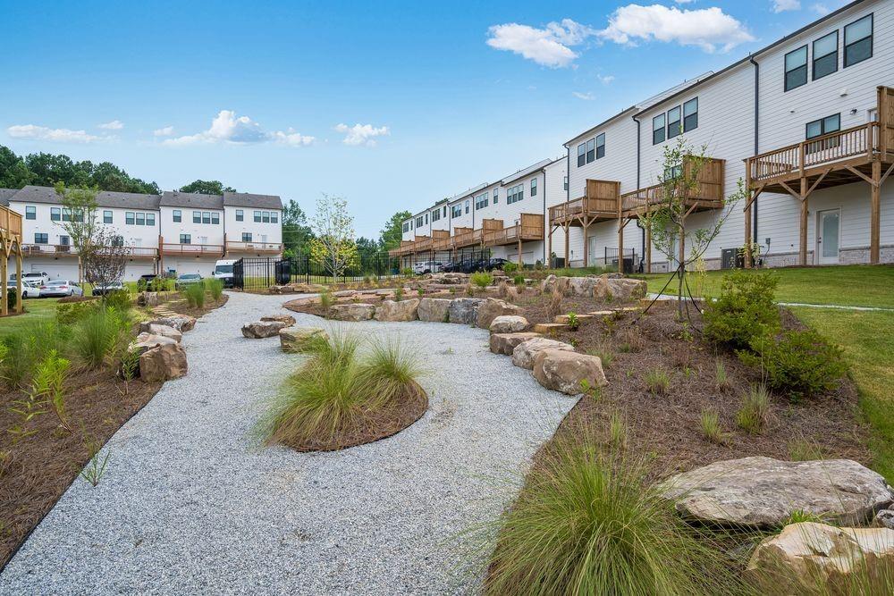 66 Wilder Ridge Way Lawrenceville, GA 30044 - Photo 43 of 44 a view of a house with a yard