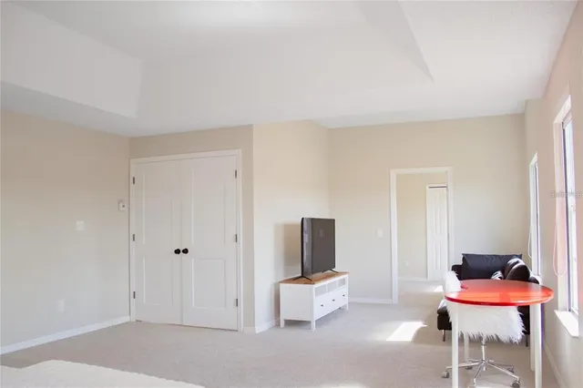 a view of a room with table and chair