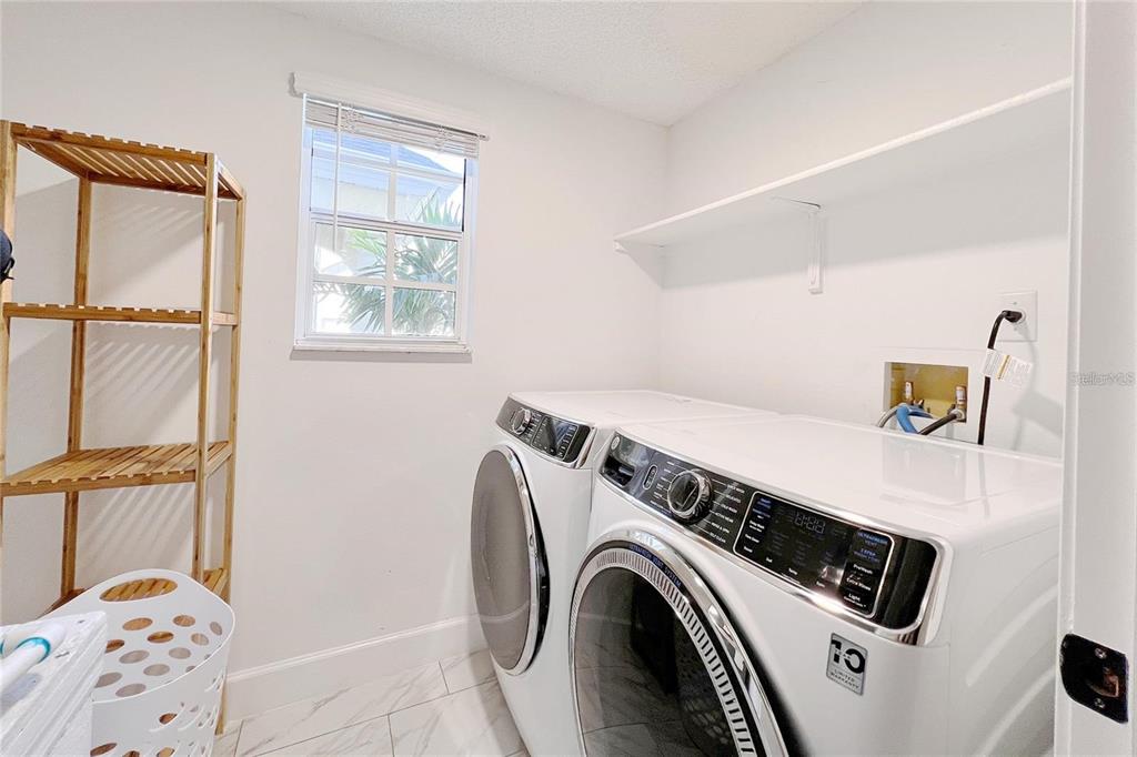 3273 Furlong Way Gotha, FL 34734 - Photo 31 of 38 a utility room with dryer and washer