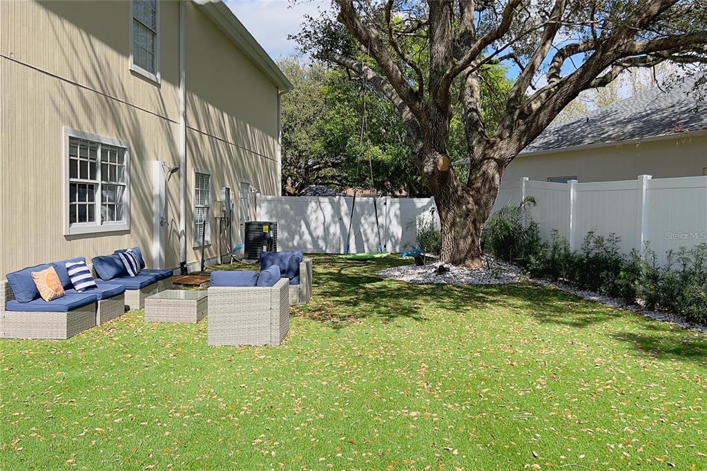 3273 Furlong Way Gotha, FL 34734 - Photo 32 of 38 a view of a house with backyard and sitting area