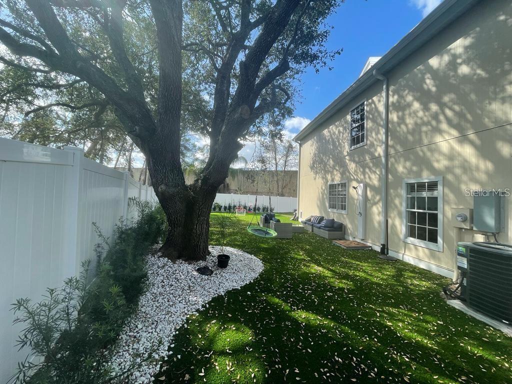 3273 Furlong Way Gotha, FL 34734 - Photo 36 of 38 a front view of a house with garden