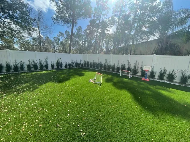 a view of a golf course with a lake