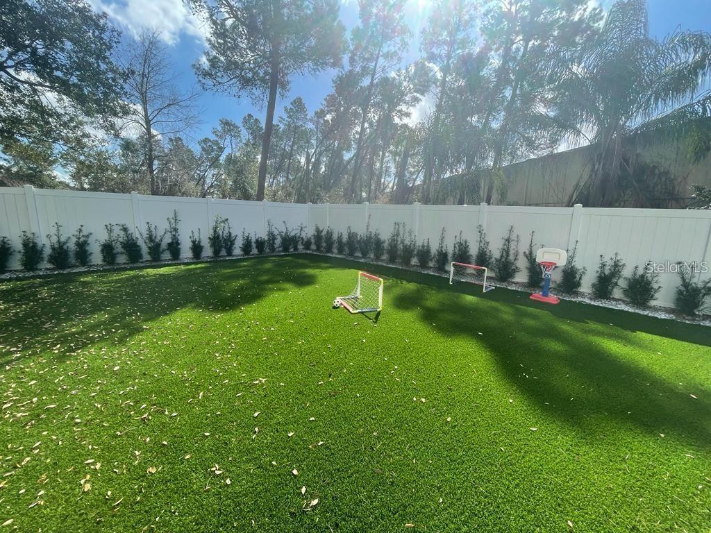 3273 Furlong Way Gotha, FL 34734 - Photo 37 of 38 a view of a golf course with a lake