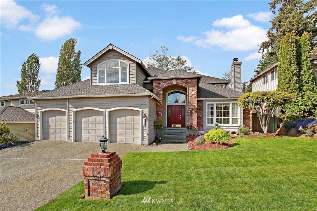 2019 237th Place Southeast Bothell, WA 98021 - Photo 1 of 26 a front view of a house with garden