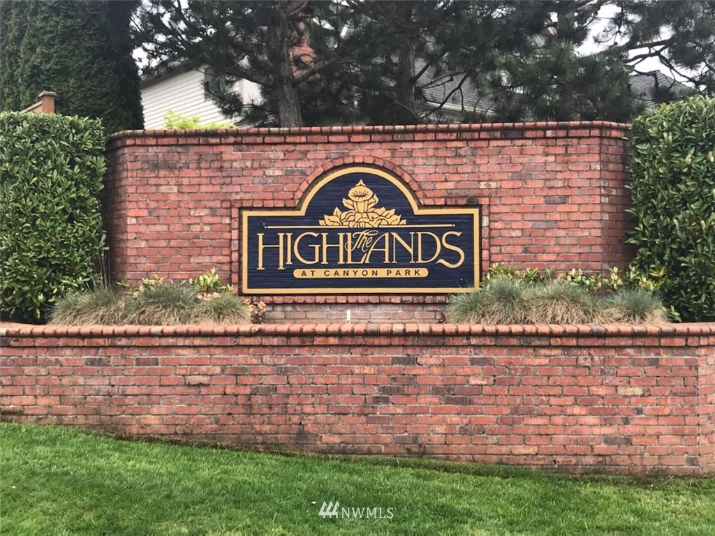 2019 237th Place Southeast Bothell, WA 98021 - Photo 2 of 26 a view of sign board with a yard