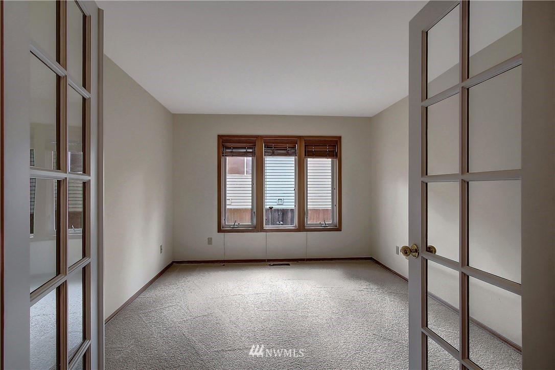 2019 237th Place Southeast Bothell, WA 98021 - Photo 12 of 26 a view of an empty room with a window