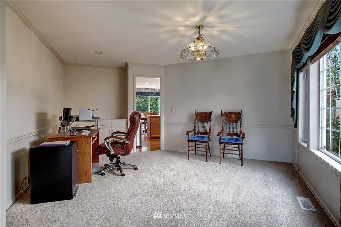 2019 237th Place Southeast Bothell, WA 98021 - Photo 13 of 26 a view of a workspace with furniture and a window