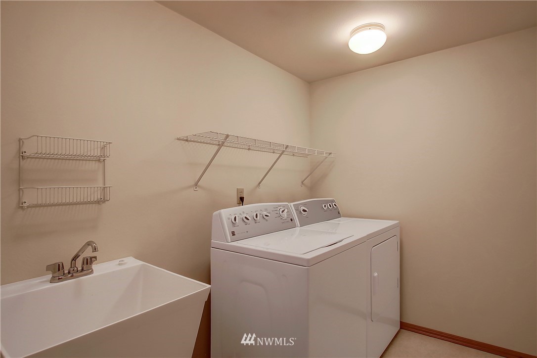2019 237th Place Southeast Bothell, WA 98021 - Photo 17 of 26 a utility room with dryer and washer
