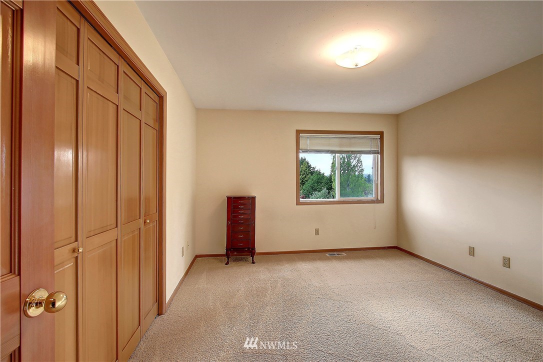 2019 237th Place Southeast Bothell, WA 98021 - Photo 22 of 26 an empty room with windows