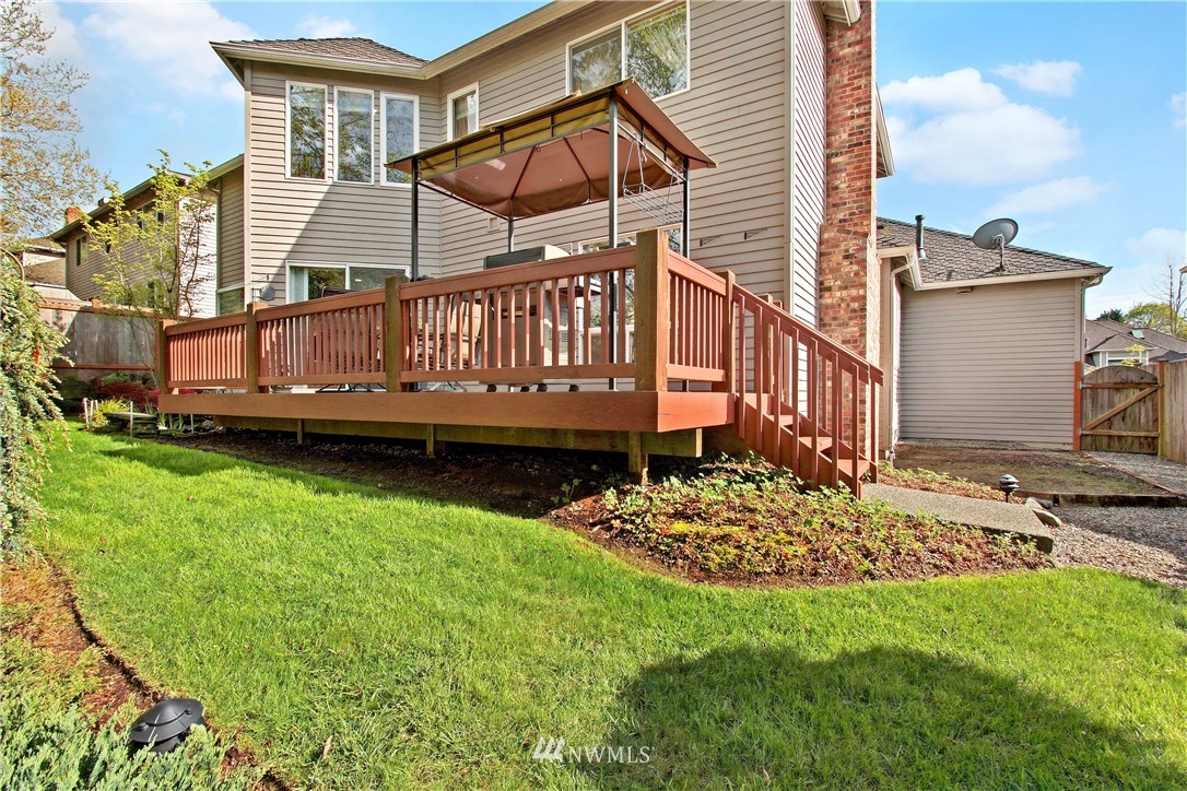 2019 237th Place Southeast Bothell, WA 98021 - Photo 25 of 26 a view of a house with a yard