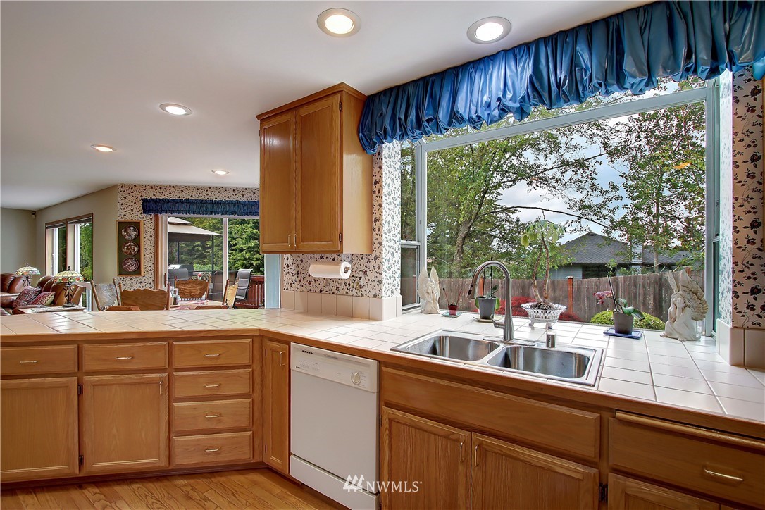2019 237th Place Southeast Bothell, WA 98021 - Photo 6 of 26 a kitchen with sink and large window