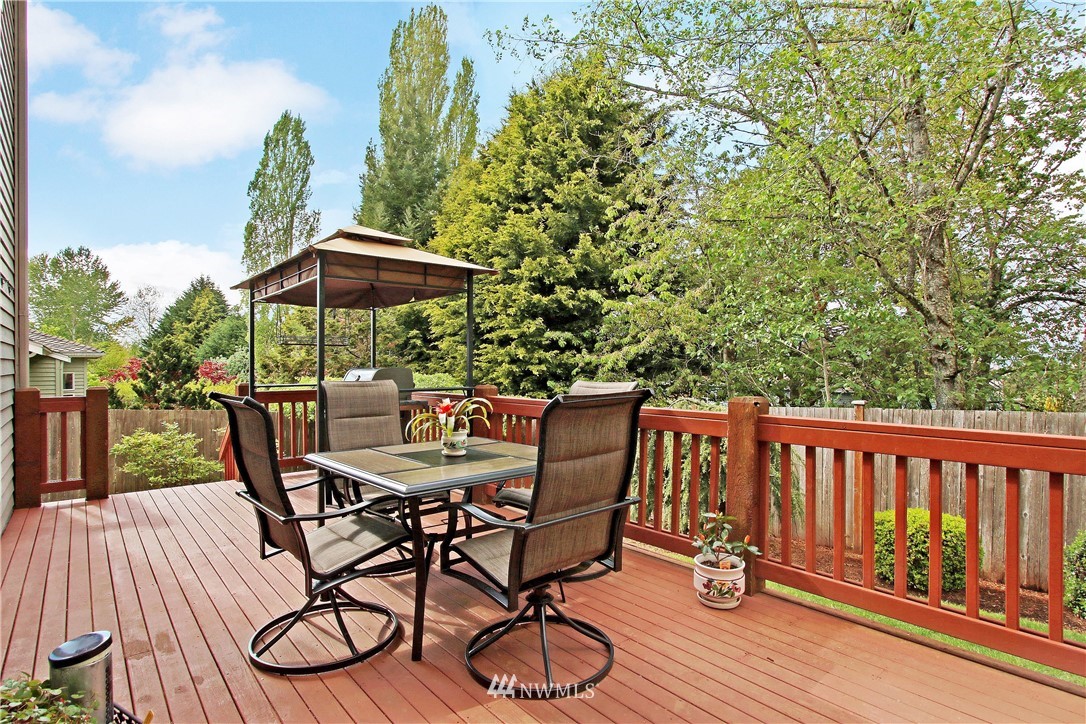 2019 237th Place Southeast Bothell, WA 98021 - Photo 8 of 26 a view of a chairs and table in the patio
