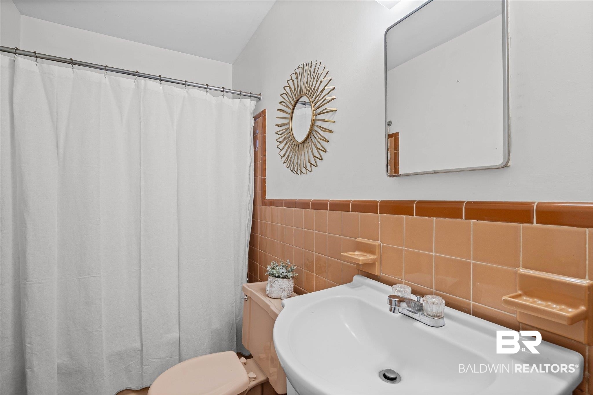 2103 Upham Court Mobile, AL 36607 - Photo 15 of 22 Bathroom with tile walls and wainscoting