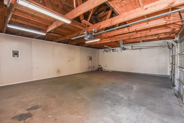 a view of a room with wooden walls