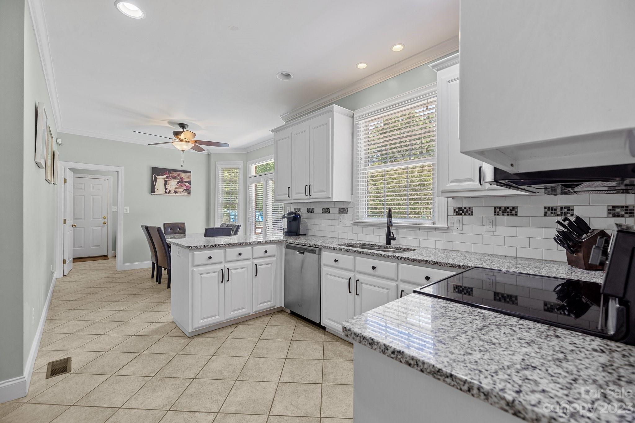 1300 Dutch Road Mount Pleasant, NC 28124 - Photo 15 of 41 a kitchen with a stove a sink and a refrigerator