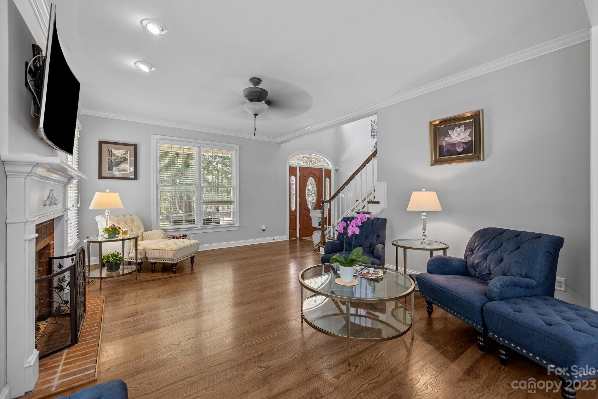 1300 Dutch Road Mount Pleasant, NC 28124 - Photo 18 of 41 a living room with fireplace furniture and a flat screen tv