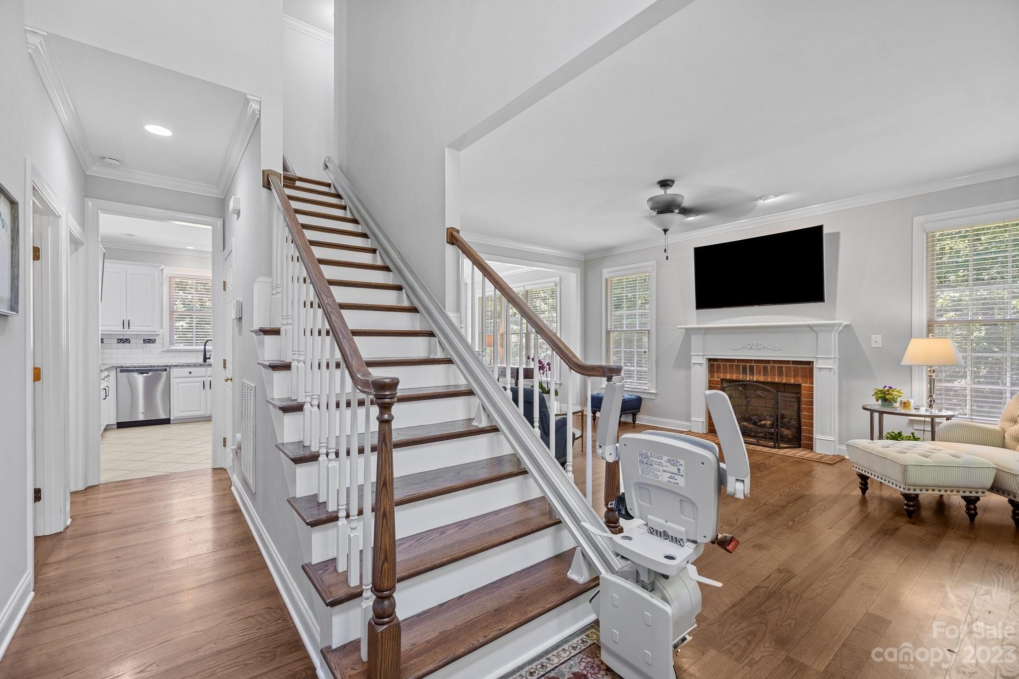 1300 Dutch Road Mount Pleasant, NC 28124 - Photo 22 of 41 a living room with furniture a fireplace and a flat screen tv