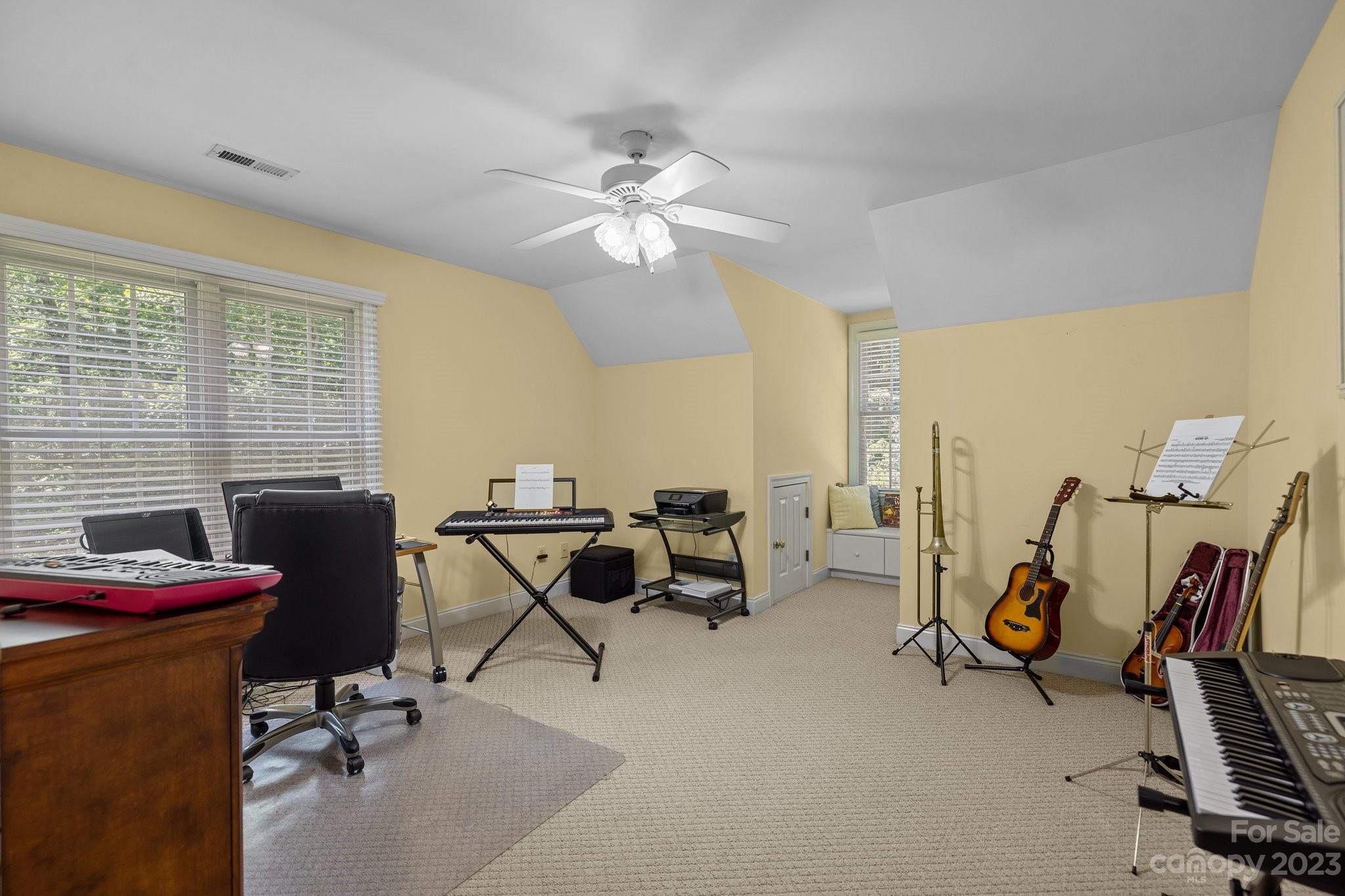 1300 Dutch Road Mount Pleasant, NC 28124 - Photo 24 of 41 a view of a workspace with furniture and a window