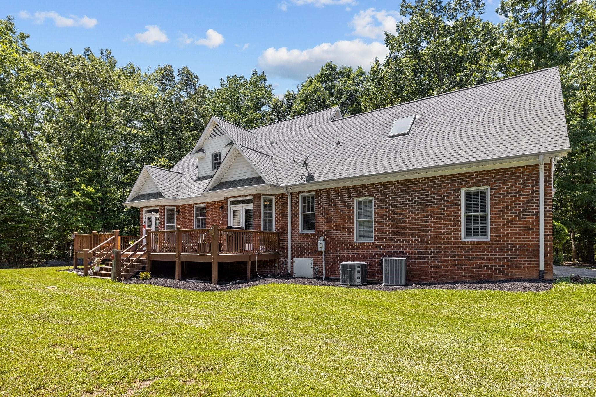 1300 Dutch Road Mount Pleasant, NC 28124 - Photo 33 of 41 a front view of a house with a garden
