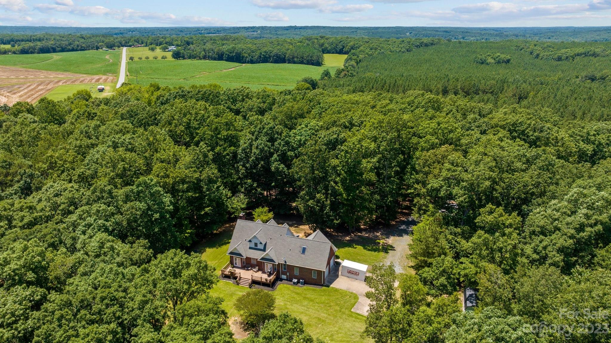 1300 Dutch Road Mount Pleasant, NC 28124 - Photo 37 of 41 an aerial view of a house with a yard basket ball court and outdoor seating