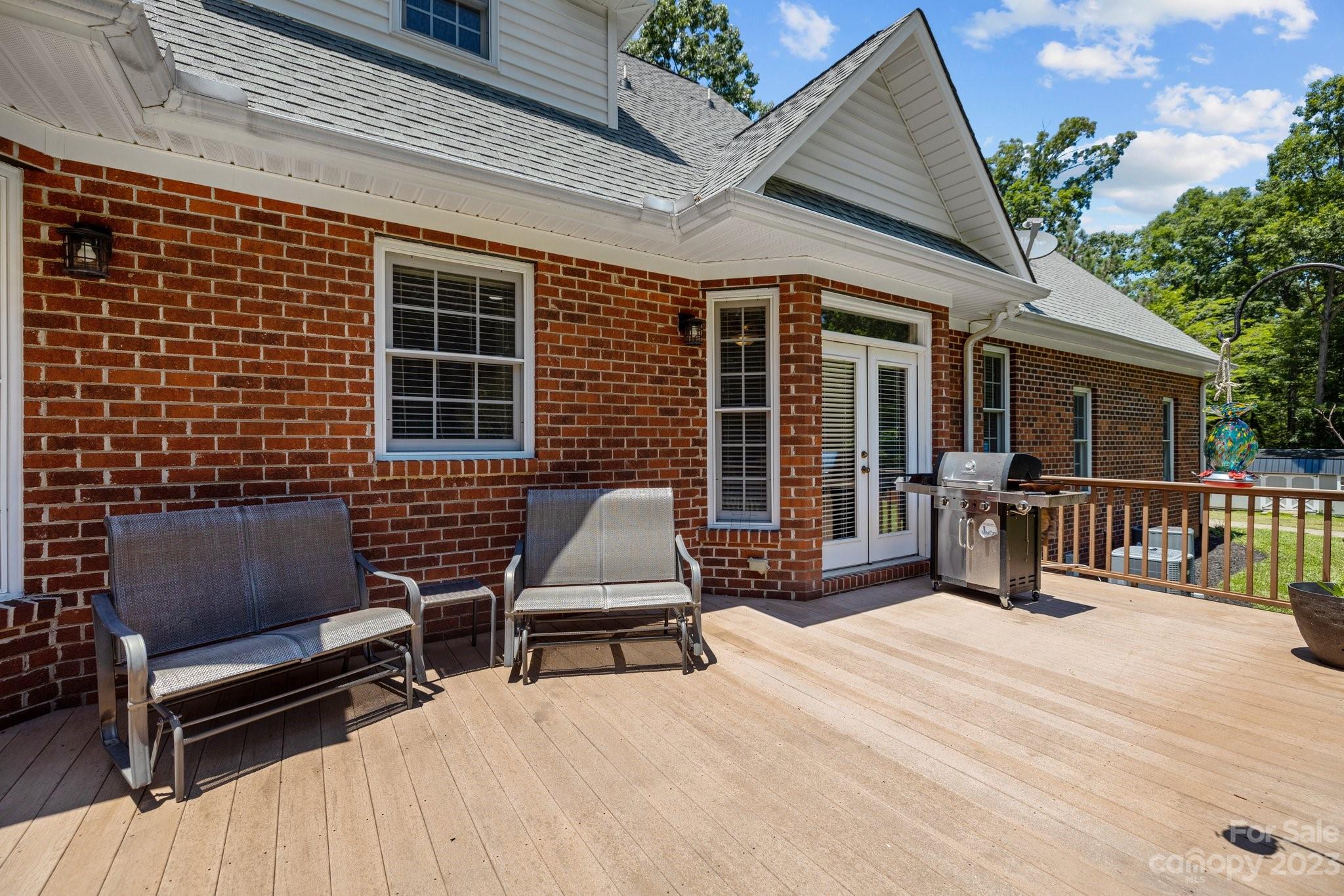 1300 Dutch Road Mount Pleasant, NC 28124 - Photo 7 of 41 a view of a chairs and table in the patio