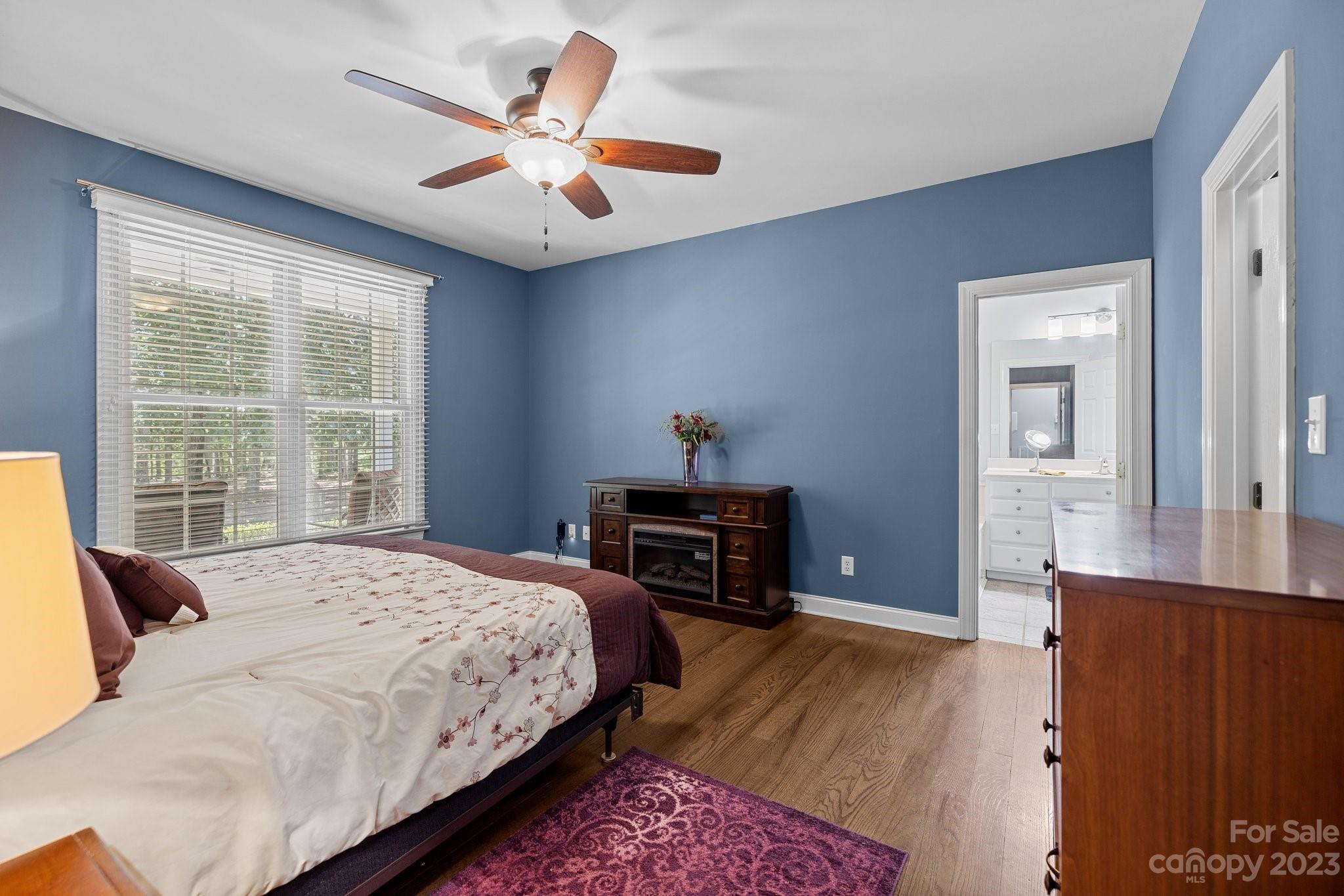 1300 Dutch Road Mount Pleasant, NC 28124 - Photo 8 of 41 a bedroom with a bed and wooden floor