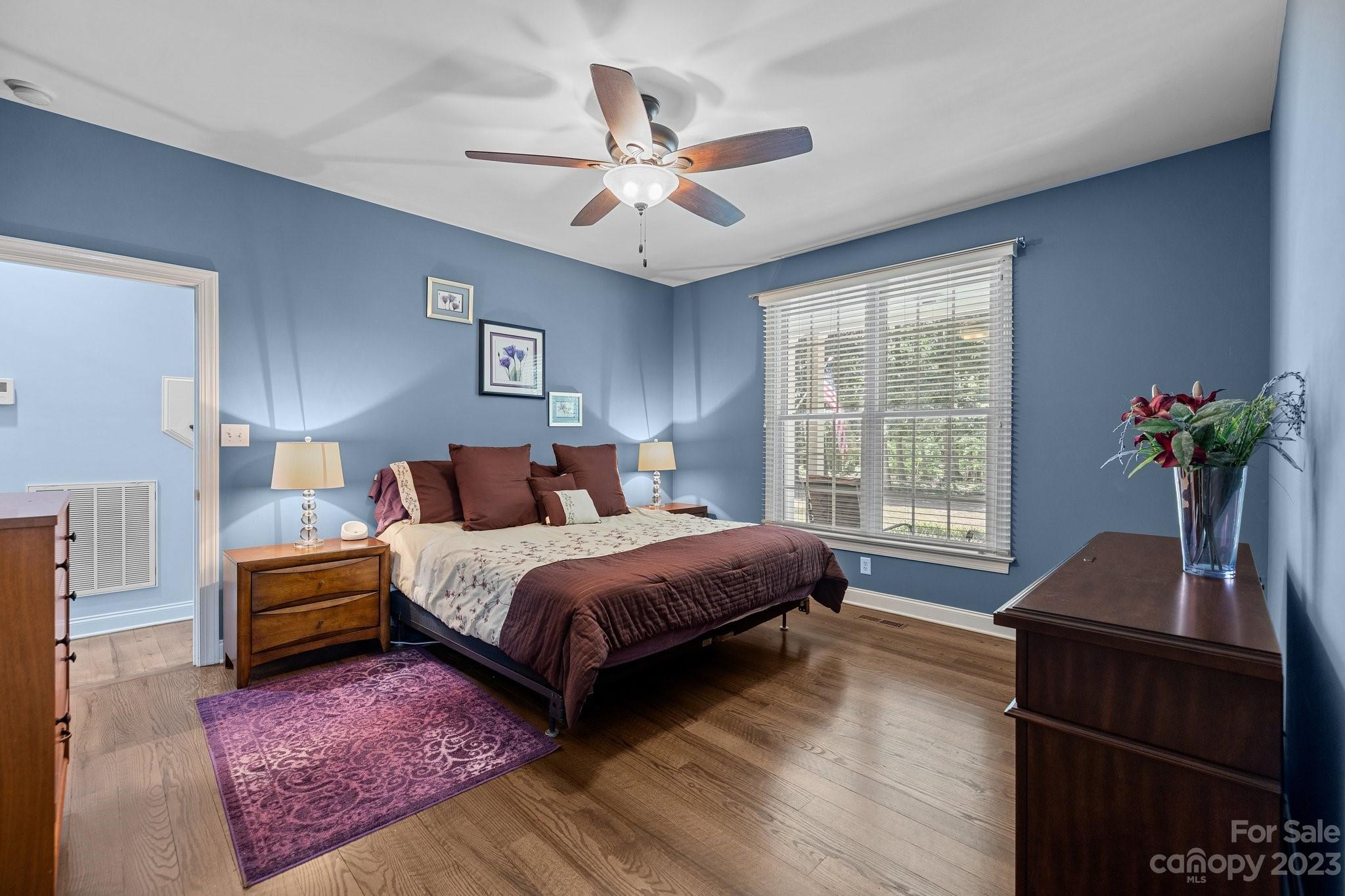 1300 Dutch Road Mount Pleasant, NC 28124 - Photo 9 of 41 a bedroom with a bed and wooden floor