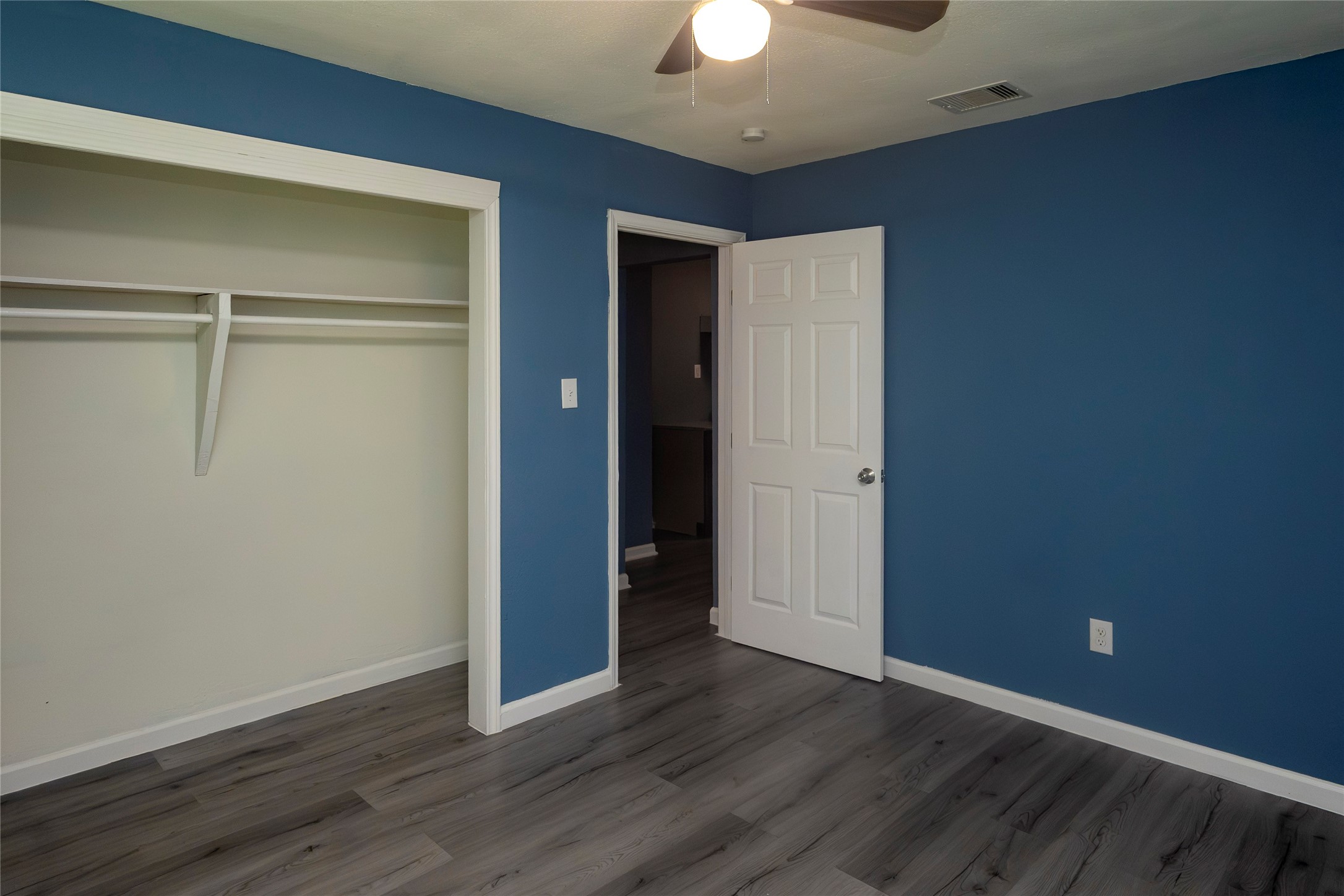 716 Hargest Street, Unit B Prairie View, TX 77445 - Photo 11 of 11 a view of an empty room with wooden floor