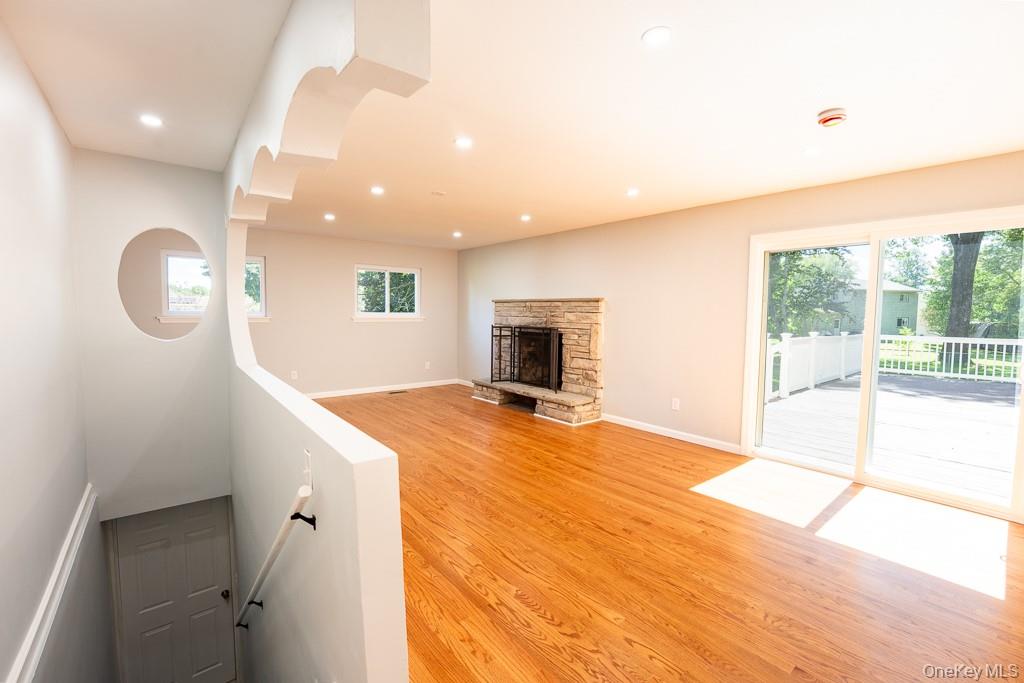 25 Robin Road Poughkeepsie, NY 12601 - Photo 12 of 37 a room with a bed and a television