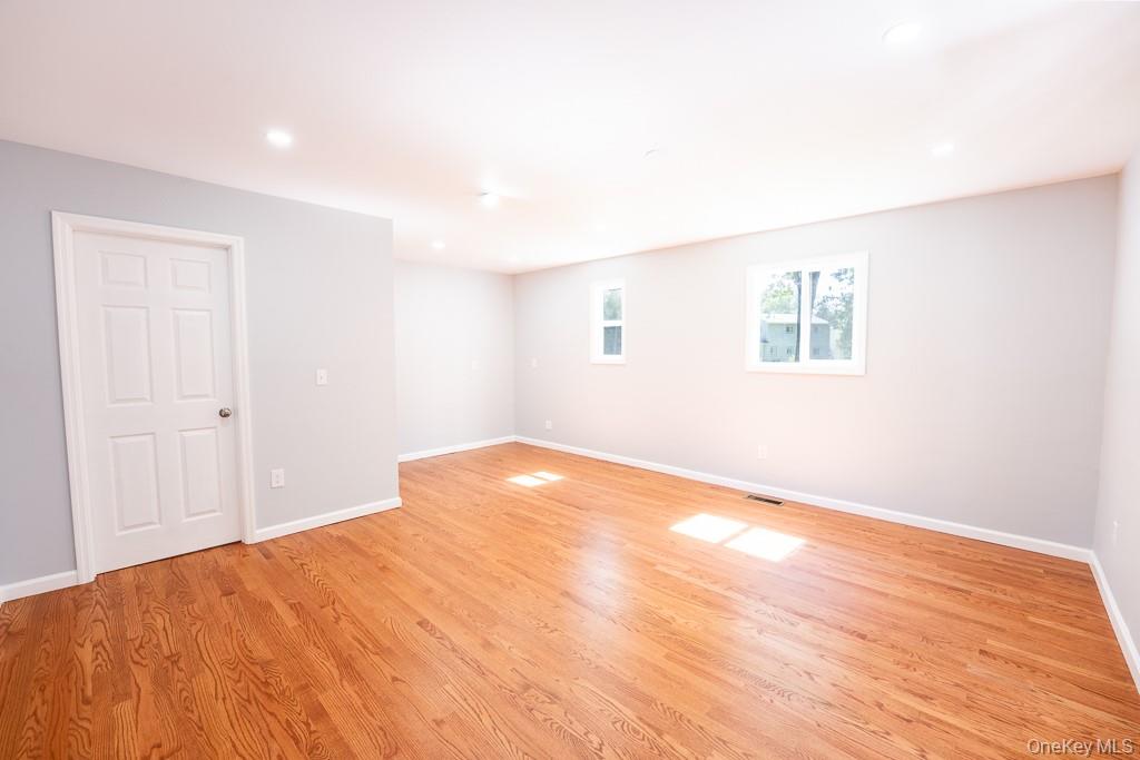 25 Robin Road Poughkeepsie, NY 12601 - Photo 17 of 37 a view of empty room with wooden floor