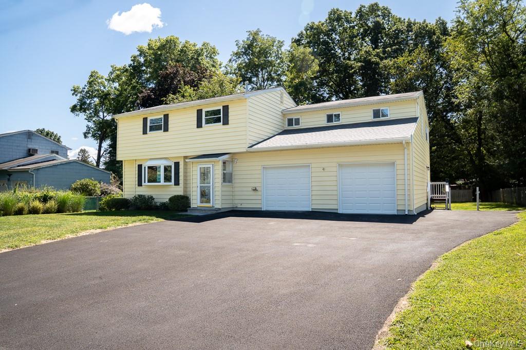 25 Robin Road Poughkeepsie, NY 12601 - Photo 2 of 37 a view of a house with a yard