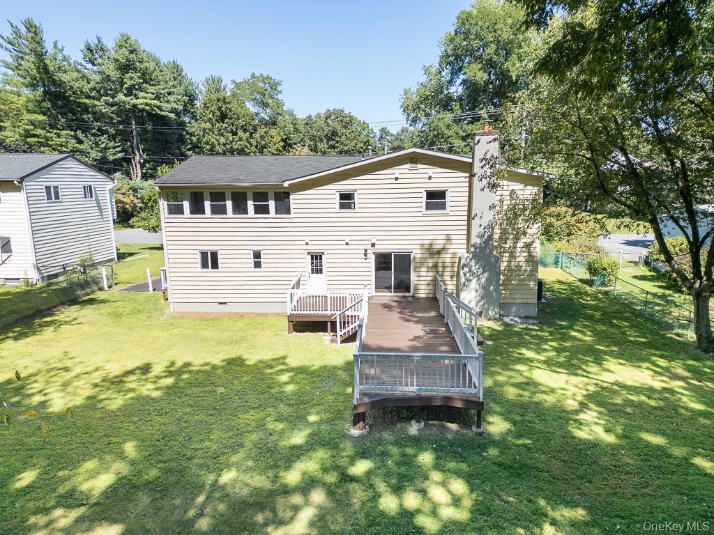 25 Robin Road Poughkeepsie, NY 12601 - Photo 3 of 37 a front view of a house with garden
