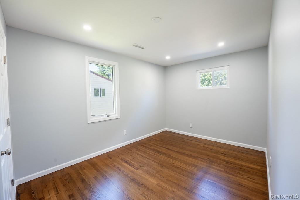 25 Robin Road Poughkeepsie, NY 12601 - Photo 32 of 37 a view of empty room with wooden floor