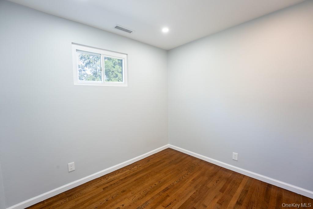 25 Robin Road Poughkeepsie, NY 12601 - Photo 34 of 37 a view of empty room with wooden floor