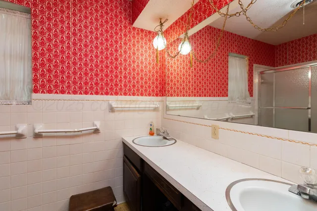 a bathroom with a shower and a toilet