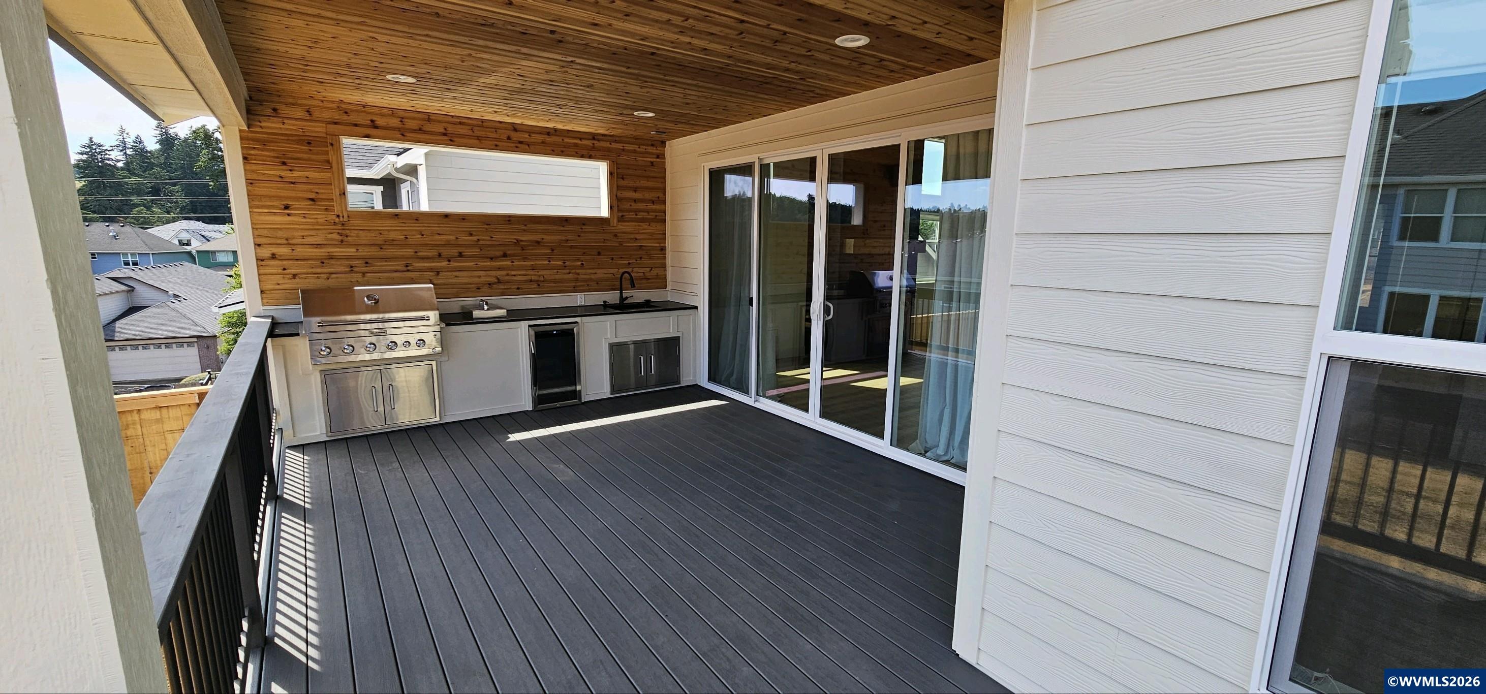 Model B Salishan Street Southeast Salem, OR 97302 - Photo 25 of 30 a view of a refrigerator and an outdoor space in the house