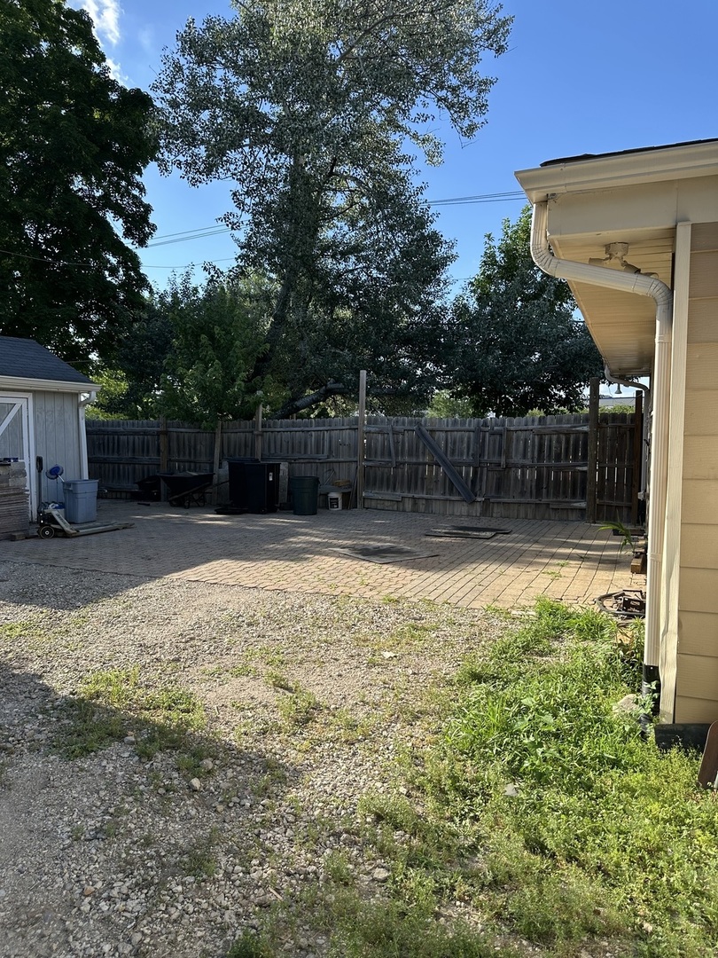 1691 Bilter Road Aurora, IL 60502 - Photo 19 of 19 a swimming pool with outdoor seating and yard