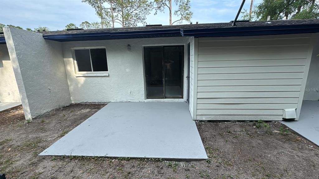 836 Southwest 64th Terrace, Unit B Gainesville, FL 32607 - Photo 5 of 13 a side view of a house