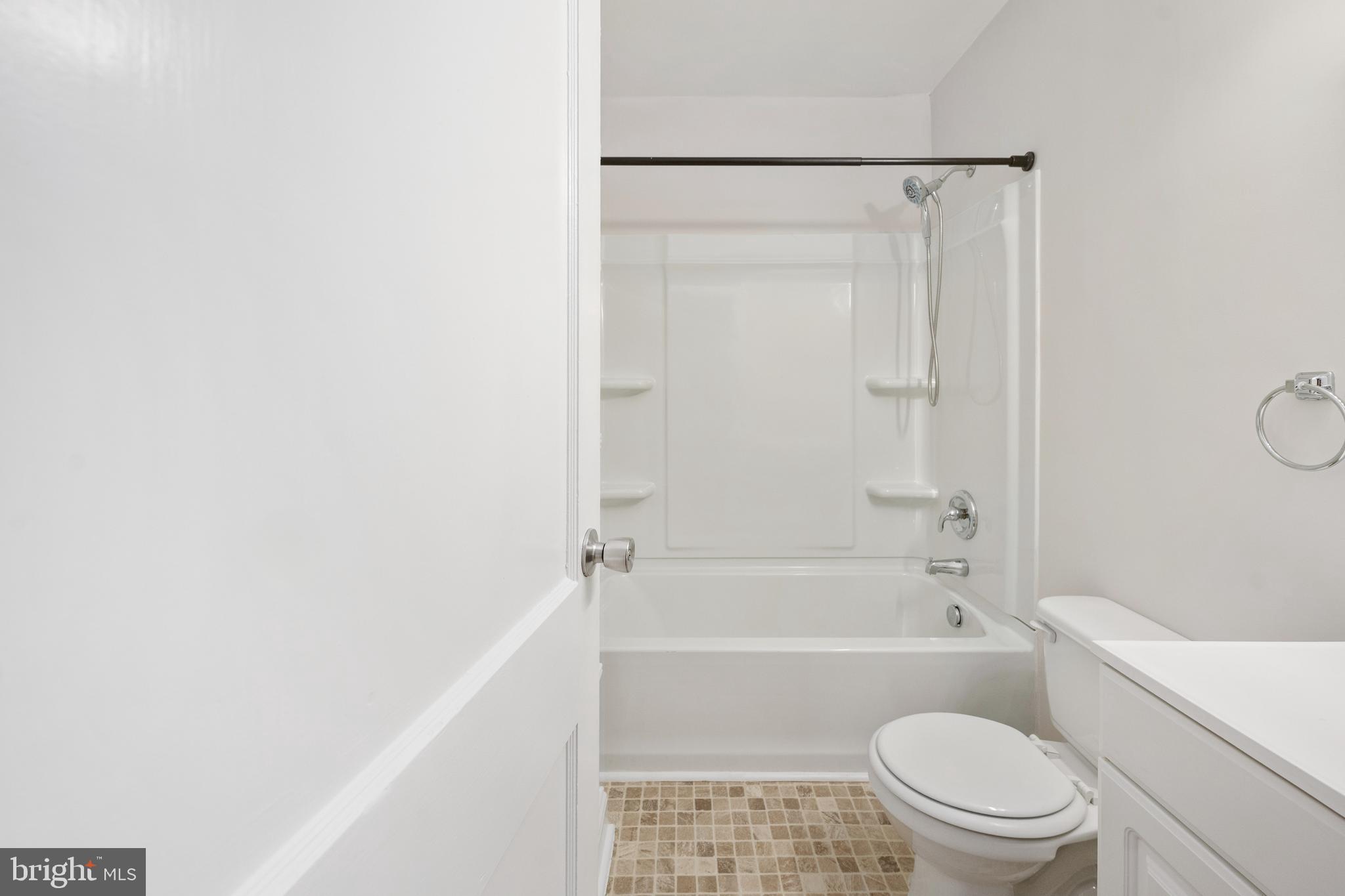 246 Berry Street Orange, VA 22960 - Photo 22 of 46 a bathroom with a toilet and a bathtub