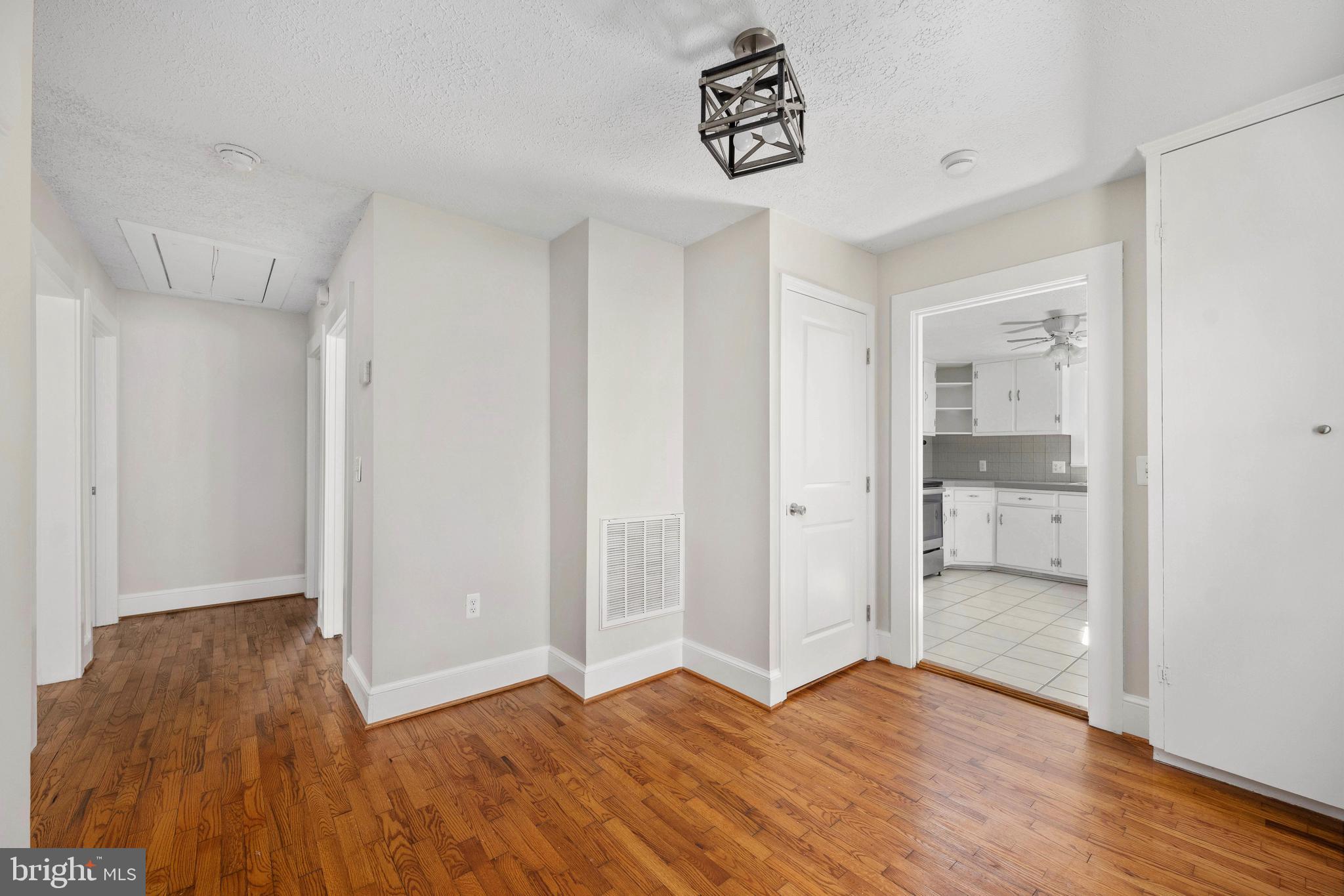246 Berry Street Orange, VA 22960 - Photo 27 of 46 a view of an empty room and wooden floor