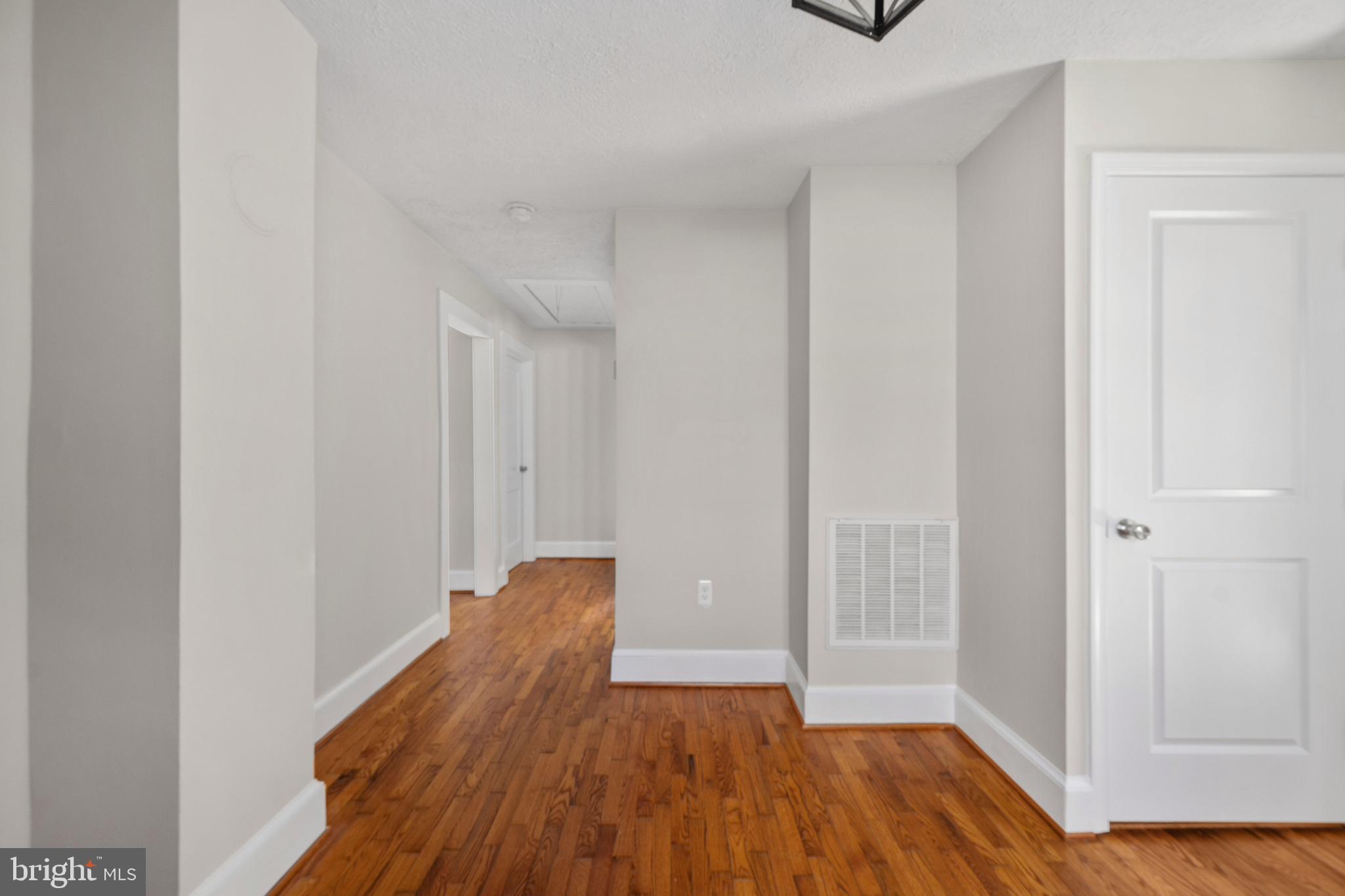 246 Berry Street Orange, VA 22960 - Photo 28 of 46 a view of a room with wooden floor and bathroom